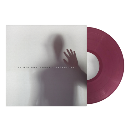 Image of the in her own words- unfamiliar album artwork as a vinyl sleeve against a transparent background. a fruit punch pink colored vinyl sticks halfway outside of the vinyl sleeve. The album artwork is white, and features a blurred shadow of a person standing with their hand pressed up against the blurred surface so that their hand is clearer than their figure. Across the center in black text it says in her own words. Next to that in white text it says unfamiliar. 